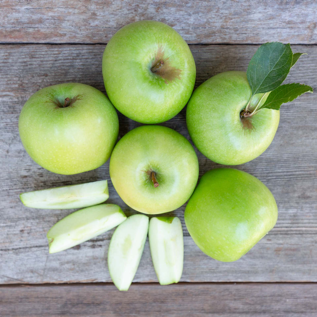 http://www.froghollow.com/cdn/shop/products/granny-smith-apples-flat-lay_1024x.jpg?v=1633395220