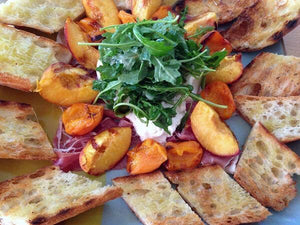 Grilled Apricots & Peaches with Burrata, Prosciutto, and Arugula