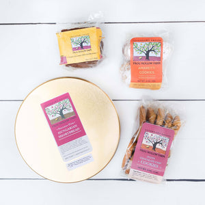 A flat lay image featuring a variety of fresh baked goods in Frog Hollow packages.